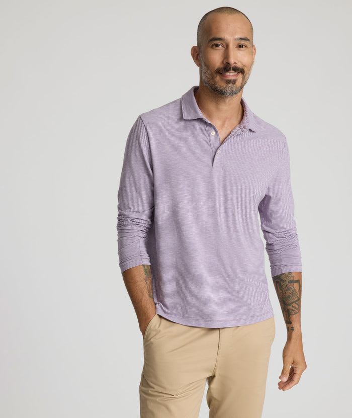 Model is wearing UNTUCKit Martinez Stripe Polo in Montana Grape.