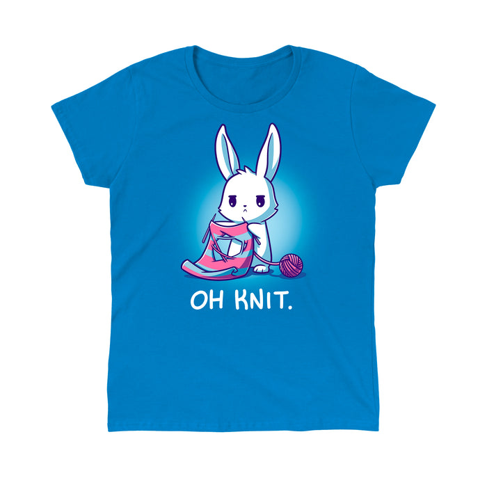 Classic Cotton T-shirt_Teeturtle sapphire blue Oh Knit apparel featuring a white rabbit looking distraught. It's holding two knitting needles attached to a blue and pink striped scarf that has a large hole in the middle. There is a ball of pink yarn trailing off to the side and text beneath it that says "Oh knit."