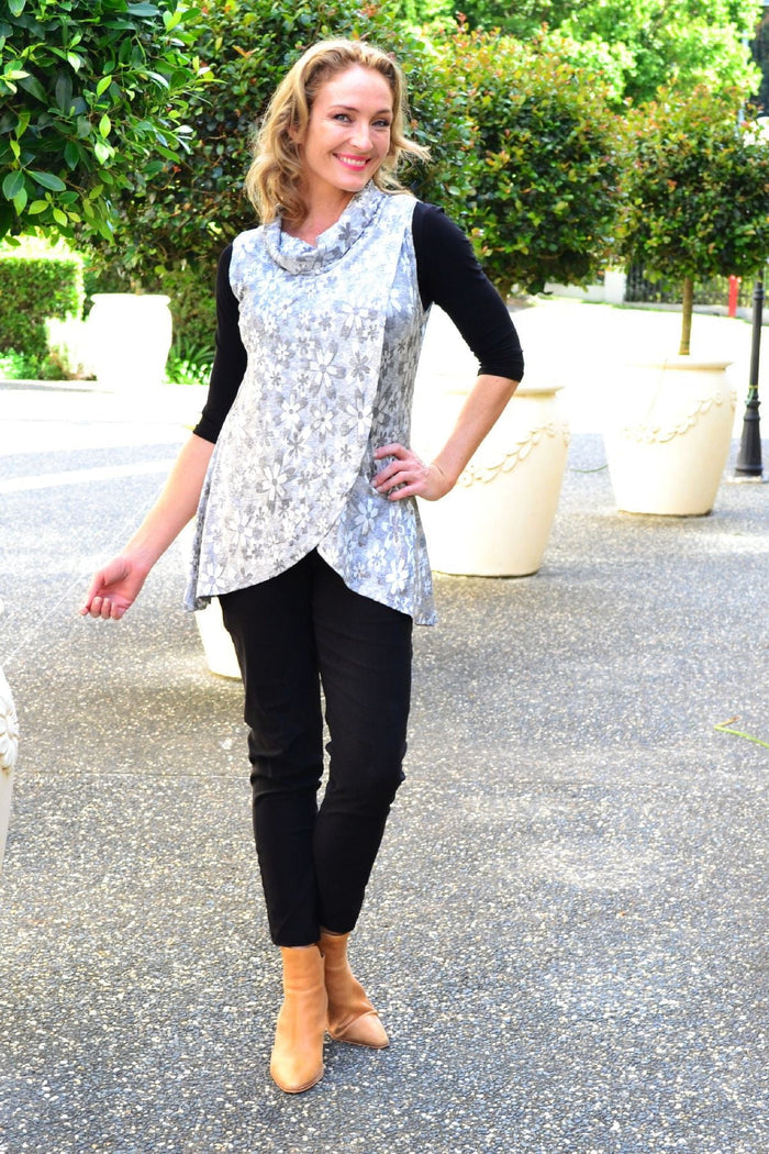 Silver flower cowl neck tunic top by Caroline Morgan featuring a flowy silhouette and floral pattern, shown on a model.