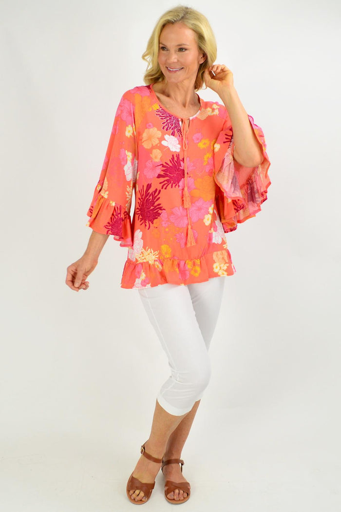 Apricot floral tunic top with wide sleeves from New U collection, loose fit, stylish for casual or summer wear.