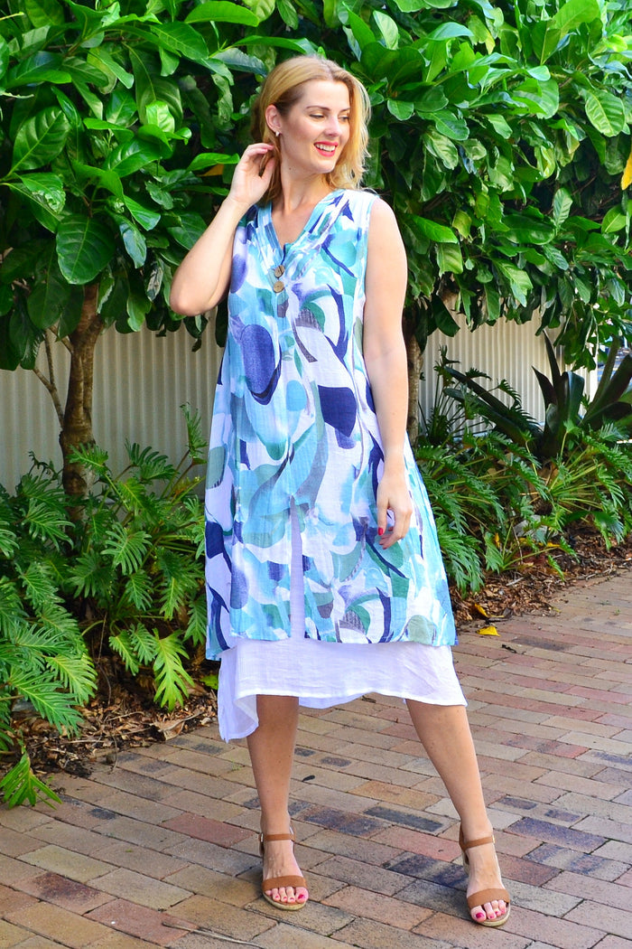 Abstract aqua tones sleeveless tunic dress by Indigo Designs, featuring a flowing fabric and stylish sleeveless design.