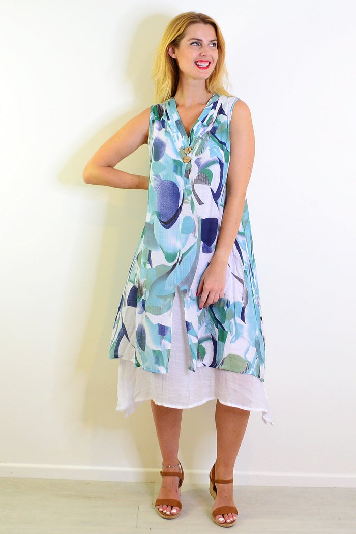 Abstract aqua tones sleeveless tunic dress by Indigo Designs, featuring a flowing fit and vibrant watercolor-inspired pattern.