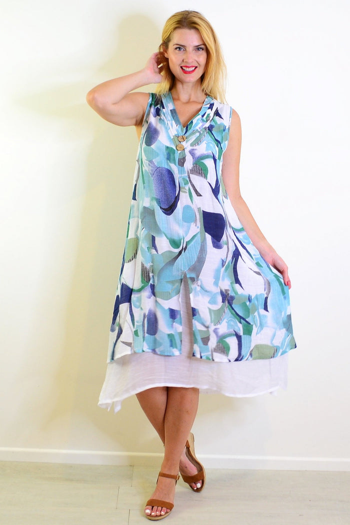 Abstract aqua tones sleeveless tunic dress by Indigo Designs, flowing fabric with a vibrant, artistic pattern for a stylish look.