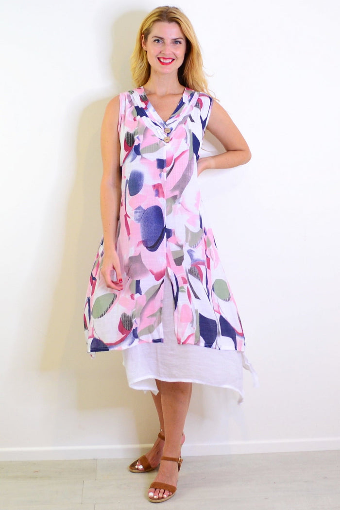 Abstract pink tones sleeveless tunic dress by Indigo Designs, featuring a relaxed fit and stylish flowy fabric.