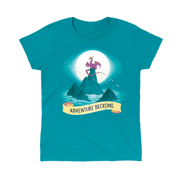 Classic Cotton T-shirt_Teeturtle Adventure Beckons Tropical Blue apparel featuring a dragon perched on a mountain peak set above the clouds with the sun behind it and the words 'Adventure Beckons' beneath.