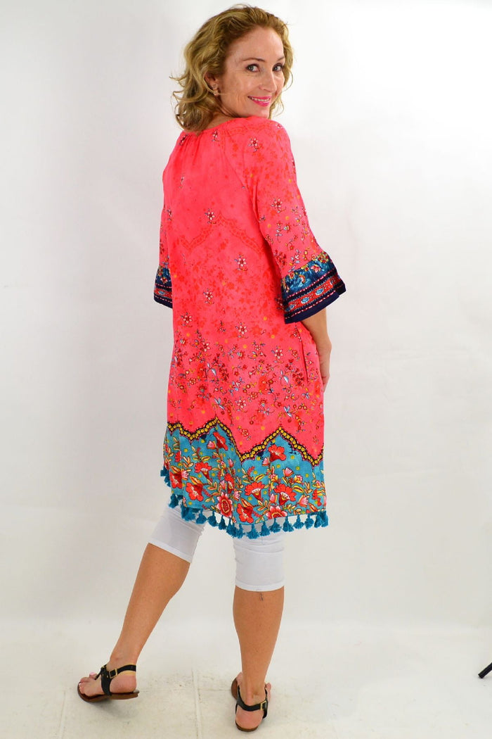 Orientique Bagatelle 3/4 sleeve tunic dress with floral pattern, lightweight fabric, and relaxed fit.