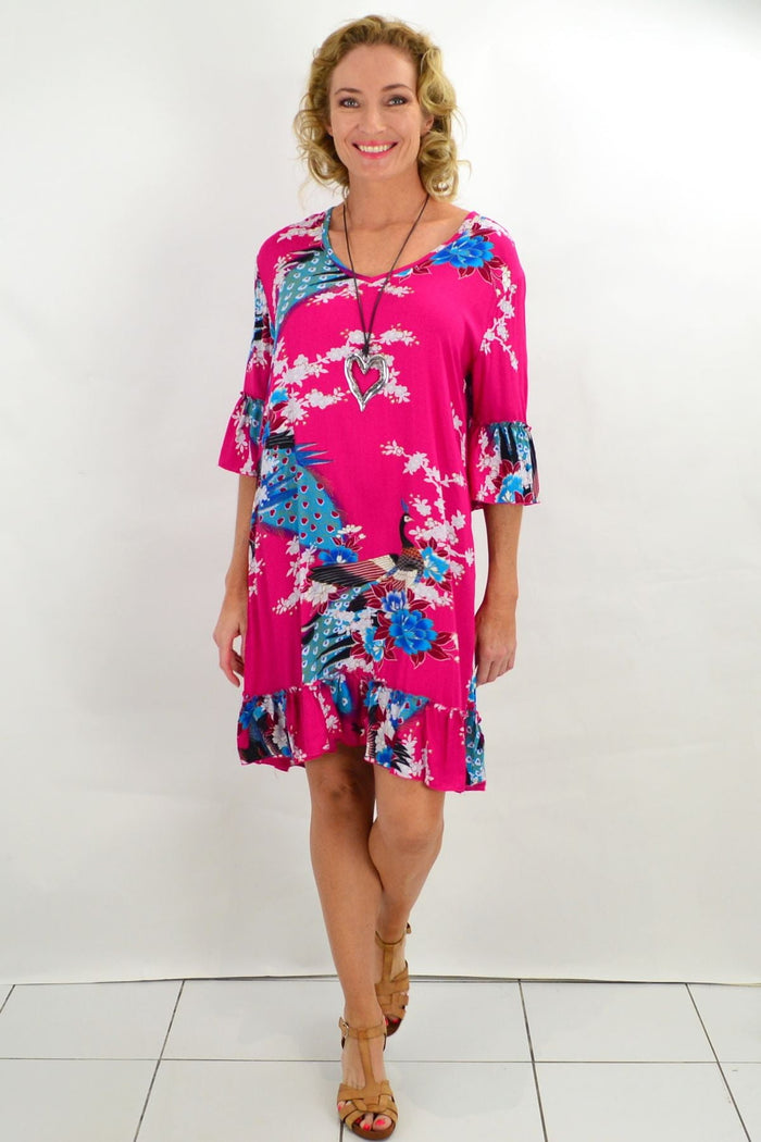 Pink peacock print tunic dress with 3/4 sleeves by Freez, featuring a flowing silhouette and vibrant feather design.