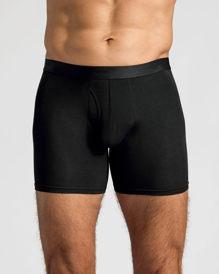 Man wearing Black Boxer Briefs W/ Fly 12-Pack, showcasing fit and support.
