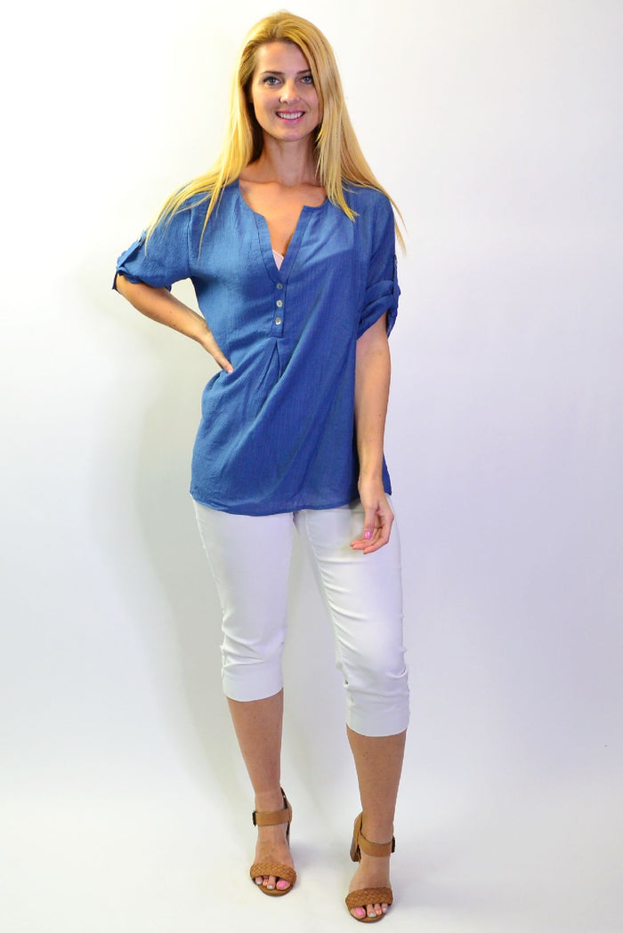Stylius Blue Lagoon Tunic Top, short blue tunic with a relaxed fit and V-neck, displayed on a white background.