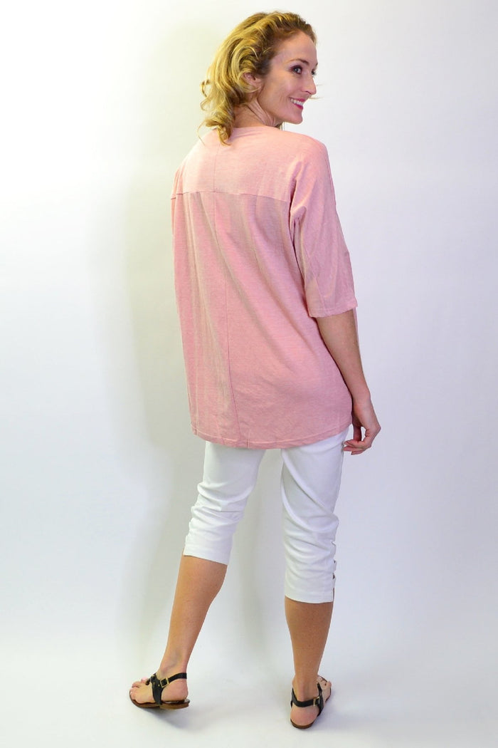 Stylish Stylius blush sloping sleeve tunic top with relaxed fit and rounded neckline, shown on a model.