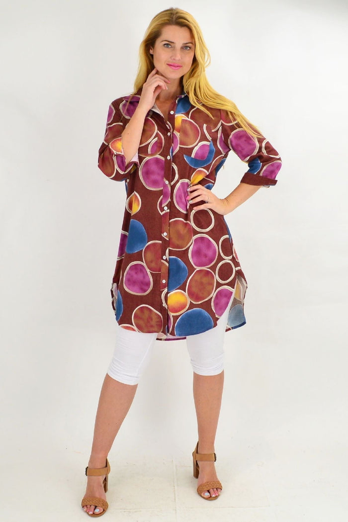 Brown colorful circles patterned tunic shirt by Ruby Rain, casual fit with long sleeves and round neckline.