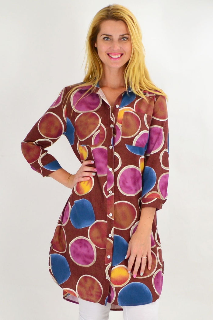 Brown tunic shirt with colorful circle pattern by Ruby Rain, featuring a relaxed fit and summer-ready style.