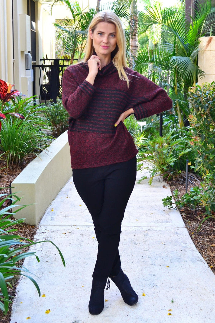 Burgundy batwing rolled neck stripe tunic jumper from I Love Tunics, showing the relaxed fit and striped pattern on the fabric.