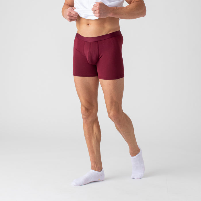 Man in Burgundy Boxer Briefs 3-Pack with white socks.