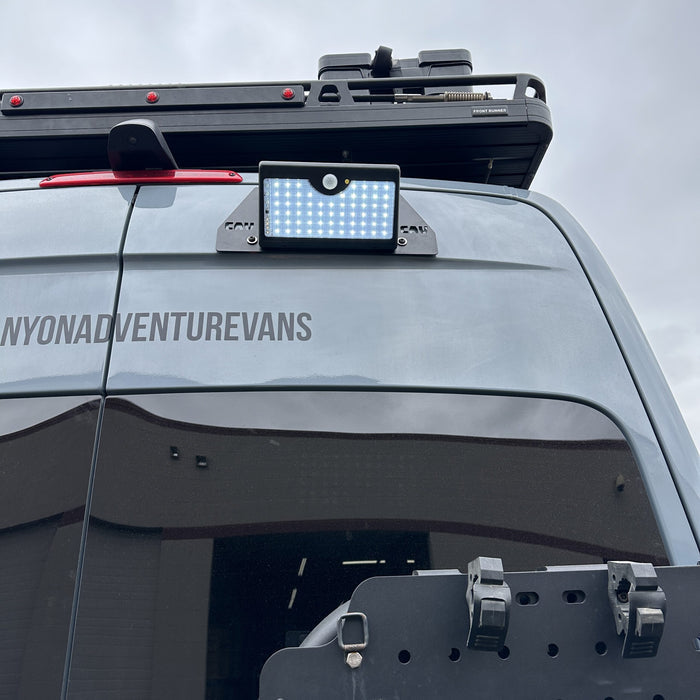 Canyon Motion Sensor Solar Light mounted on rear exterior of a Revel van