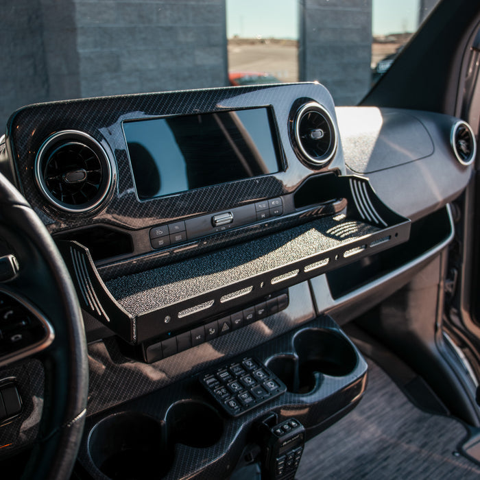 CAV D-ash Tray Pro installed in van dashboard with carbon fiber finish and organized tray space