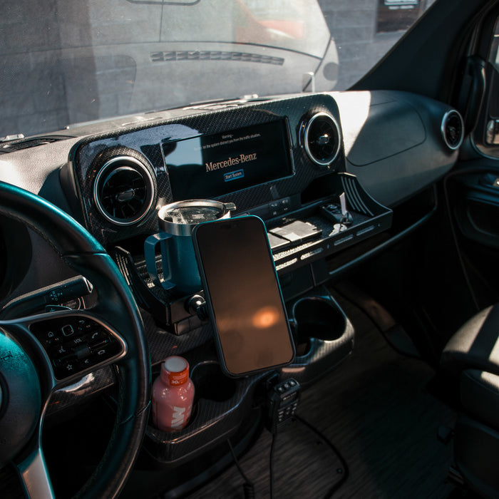 CAV D-ash Tray Pro installed in van cockpit with mounted phone and drink holder.