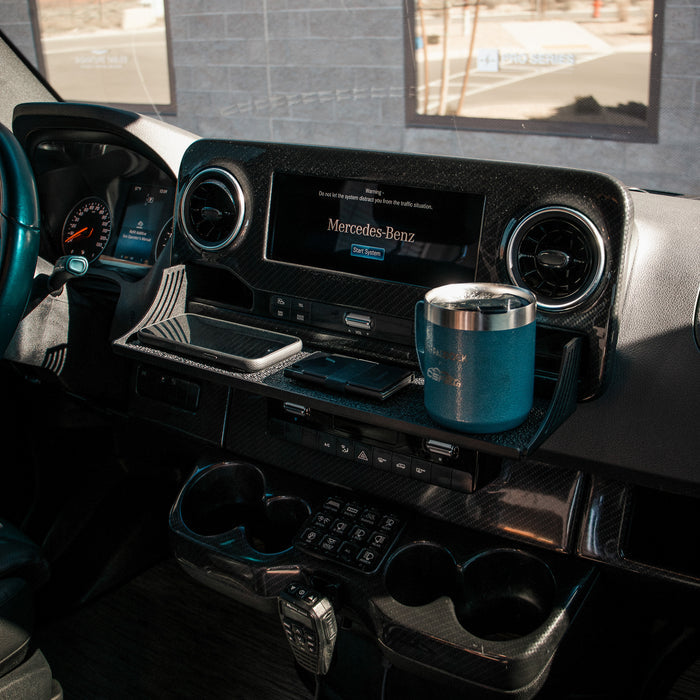 CAV D-ash Tray installed on van dashboard holds phone, wallet, and cup in organized compartments.