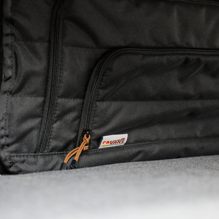 CLIMA-SHADE insulated bunk window cover installed in van interior with zipper detail visible