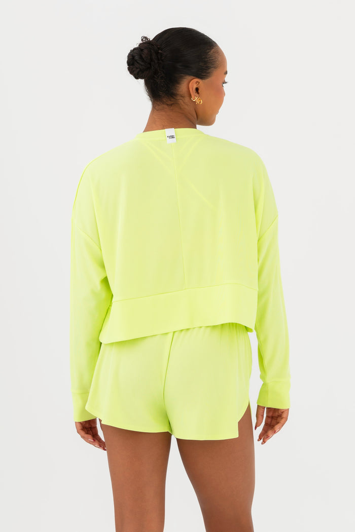 Every Turn Disco Pullover Sweater  In Yellow Zing, Oversized, Cropped Fit, Back View.