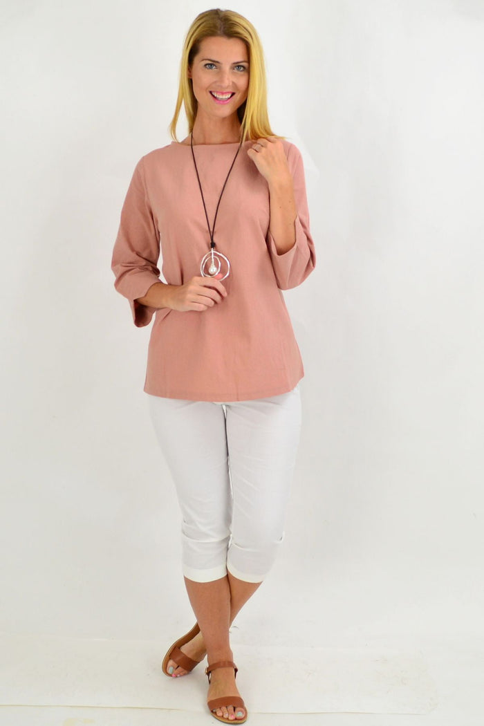 Dusty pink Sunshine box tunic blouse with long sleeves and relaxed fit, perfect for casual or office wear.