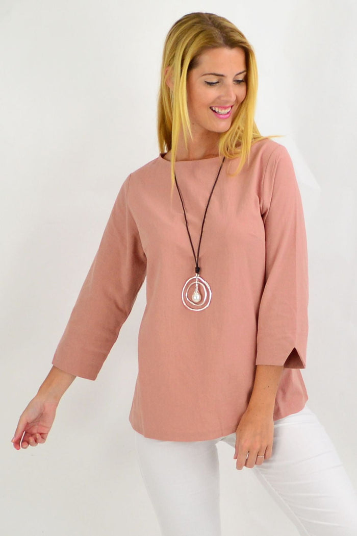 Dusty pink box tunic blouse by Sunshine, featuring a relaxed fit and stylish design, perfect for casual or office wear.
