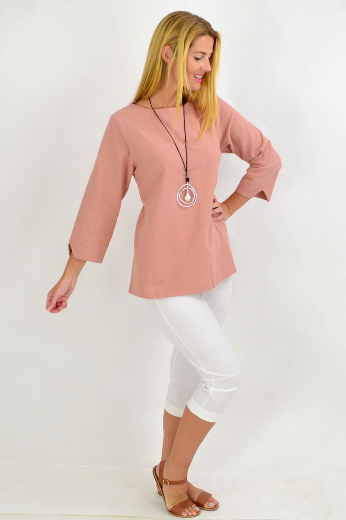 Dusty pink box tunic blouse for women by Sunshine, featuring a relaxed fit and stylish design, perfect for casual and chic outfits.