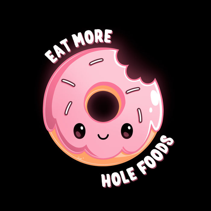 Classic Cotton T-shirt_TeeTurtle black Eat More Hole Foods apparel featuring a smiling pink sprinkle donut with a bite taken out of it. Caption reads, "eat more hole foods".