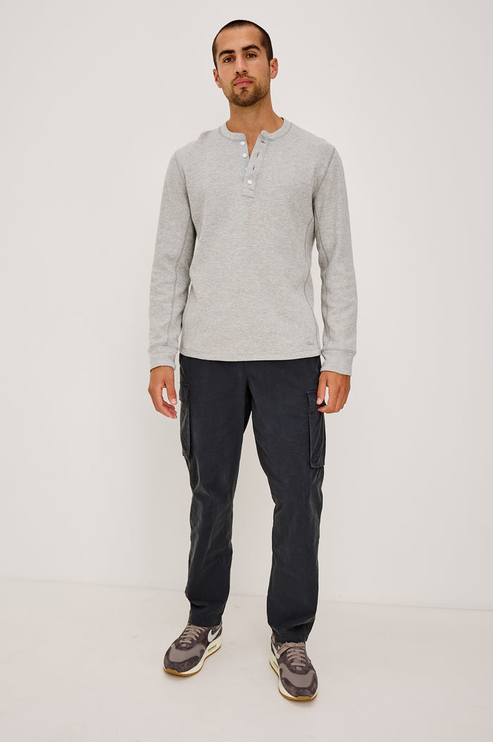Emmerson Pant in Lightweight Cotton With Cargo Pockets and Drawstring Waist in Washed Black Colorway - Full Body Front View Featured on Model