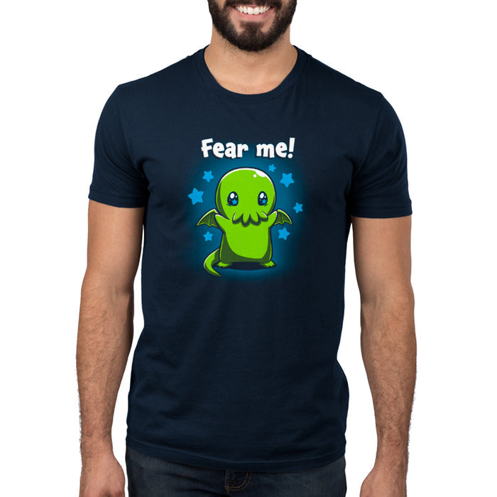 Premium Cotton T-shirt_Teeturtle Fear Me! Navy Blue t-shirt featuring a cute Cthulhu with starry eyes surrounded by stars with the words 'Fear me!' written above its head in this magical creature design.