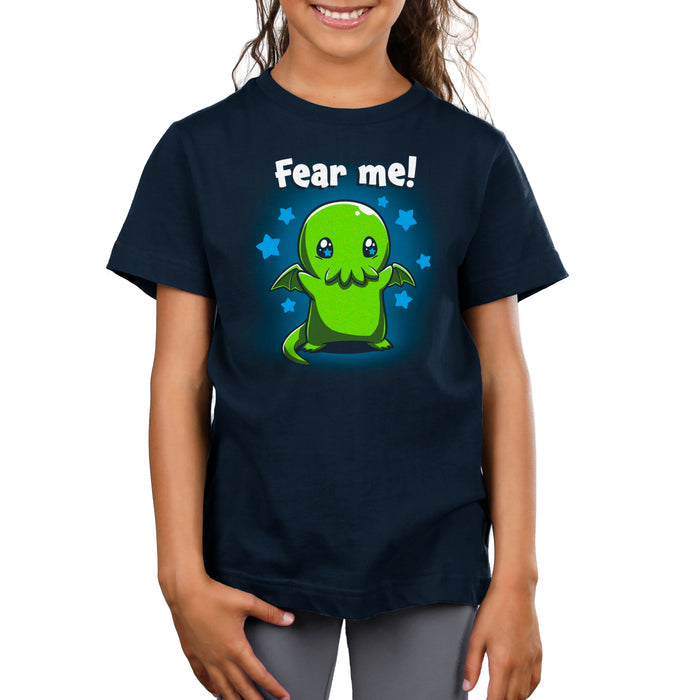 Premium Cotton T-shirt_Teeturtle Fear Me! Navy Blue t-shirt featuring a cute Cthulhu with starry eyes surrounded by stars with the words 'Fear me!' written above its head in this magical creature design.