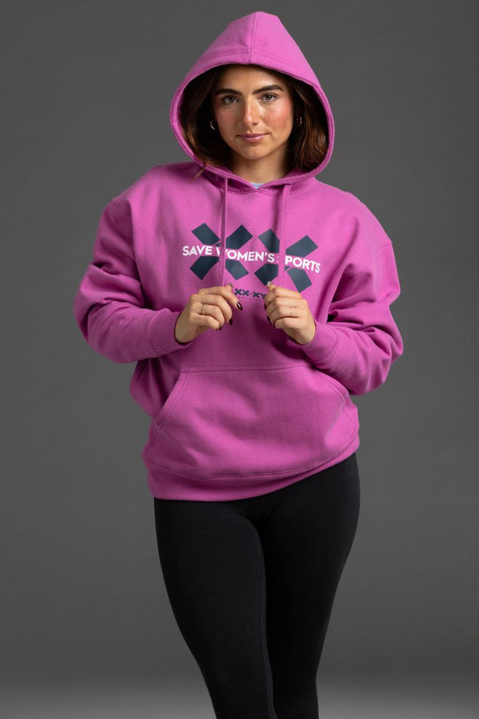 Person wearing a pink hoodie with text on a gray background || Bright Fuchsia