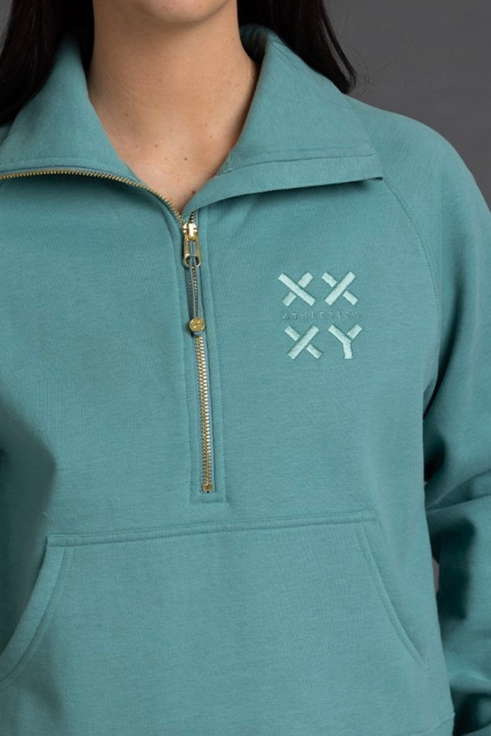 Teal pullover with a logo on the chest || Underseas