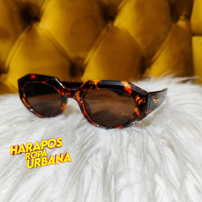Gafas atigradas con lineas doradas