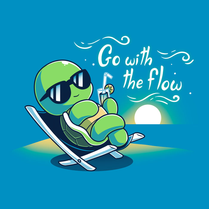 Classic Cotton T-shirt_Teeturtle sapphire blue Go with the Flow apparel featuring a turtle lounging on a beach chair with a tropical drink and sunglasses as the sun sets in the distance with the words 'Go with the Flow' to one side.