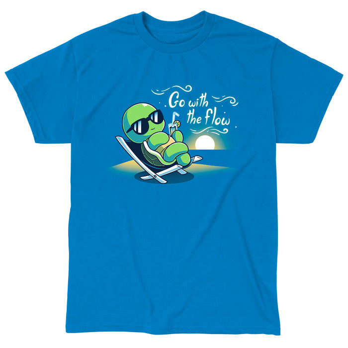 Classic Cotton T-shirt_Teeturtle sapphire blue Go with the Flow apparel featuring a turtle lounging on a beach chair with a tropical drink and sunglasses as the sun sets in the distance with the words 'Go with the Flow' to one side.