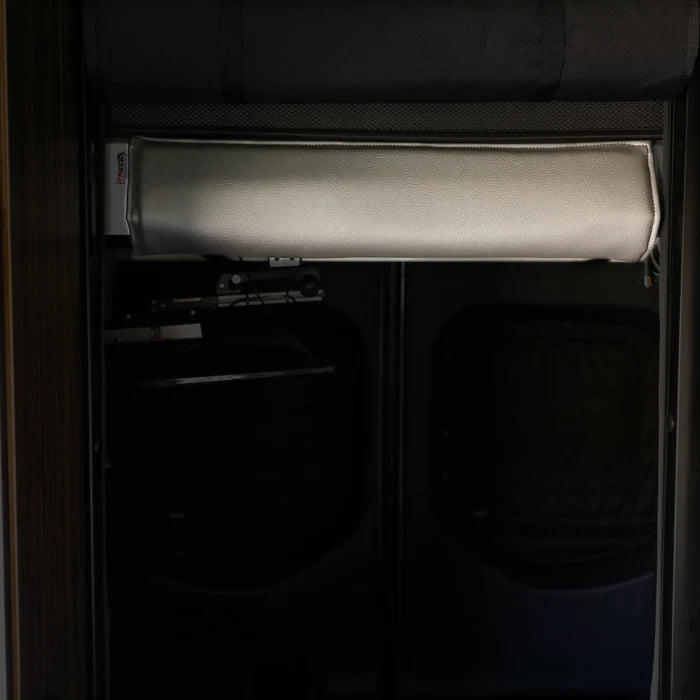 Revel head bumper bed accessory installed inside van interior for 2019 and newer models.
