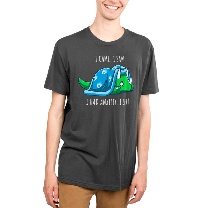 Premium Cotton T-shirt_Teeturtle I Had Premium Cotton T-shirt_Teeturtle charcoal gray I Had Anxiety. I Left. apparel featuring an anxious-looking triceratops hiding under a weighted blanket with the caption 'I came. I saw. I had Anxiety. I left.'