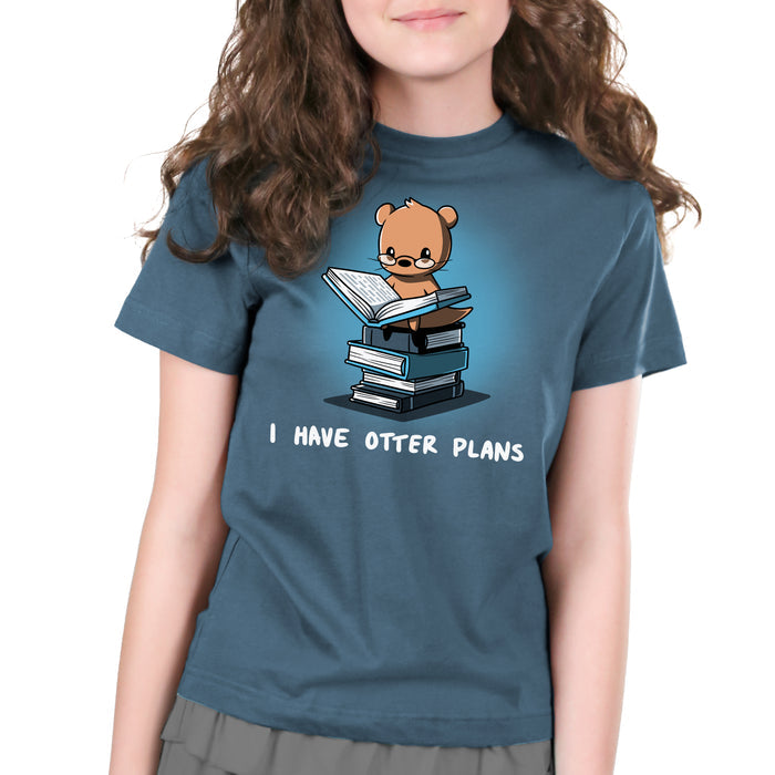 Premium Cotton T-shirt_Teeturtle denim blue I Have Otter Plans apparel featuring a studious-looking otter in reading glasses reading a book while sitting on a pile of books. Caption reads 'I Have Otter Plans'.