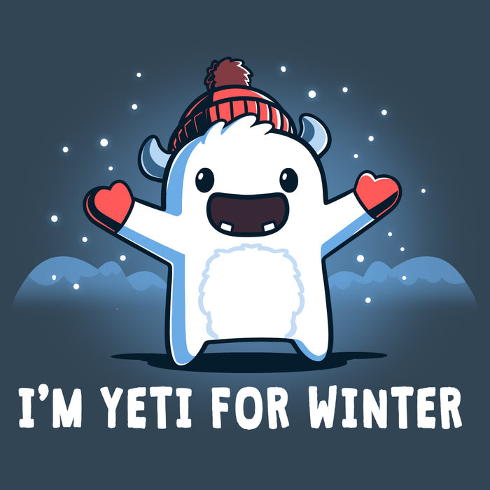 Premium Cotton T-shirt_Teeturtle denim  blue I'm Yeti for Winter apparel featuring a happy Yeti in the snowy winter mountains wearing a pom-pom winter hat and mittens. Caption reads "I'm yeti for winter".