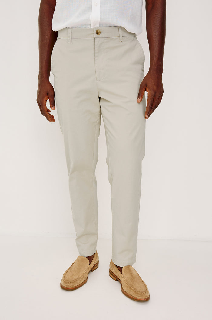 Irving Slim Straight Pant With Side Slant Pockets, and Back Welt Pockets in Stone Colorway - Lower Body Front View Featured on Model