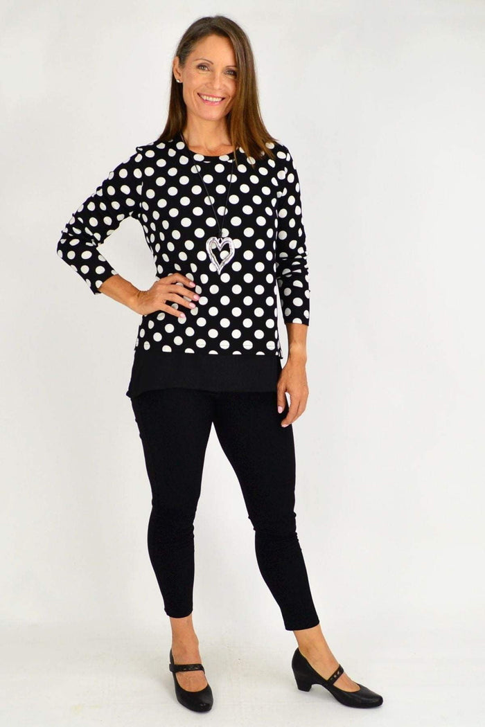 Black and white spotted Jillian Spot Tunic Top by Stylius, featuring a relaxed fit and stylish design.