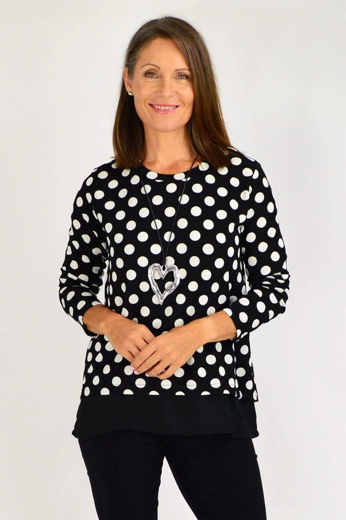 Black and white spotted Jillian Spot Tunic Top by Stylius, featuring a relaxed fit and stylish pattern.