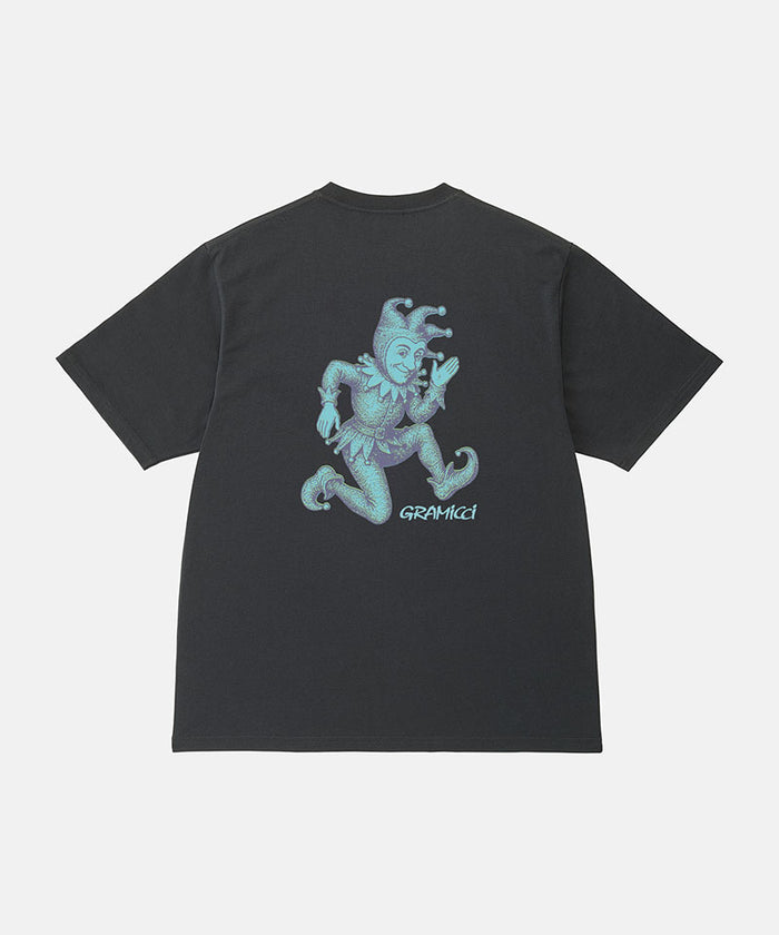 Back view of a Gramicci vintage black Joker Tee with a teal graphic against a light-tone background.