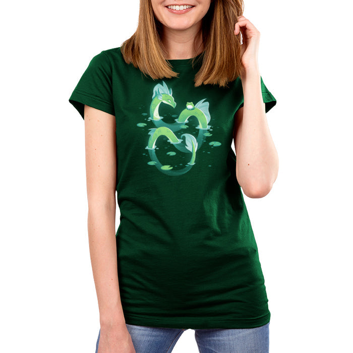 Premium Cotton T-shirt_TeeTurtle forest green Lagoon Dragon apparel featuring an artistic dragon in a lagoon with lily pads around it and a frog sitting on it's back.