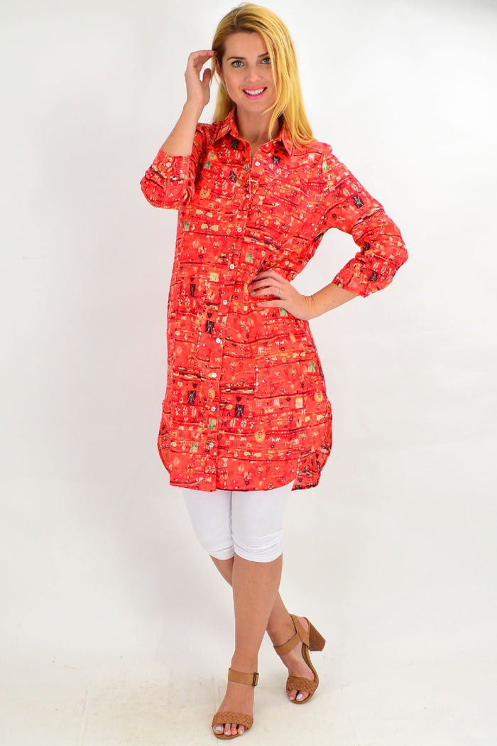 Long orange abstract tunic shirt by Ruby Rain featuring a vibrant red design, perfect for summer ladies' casual wear.