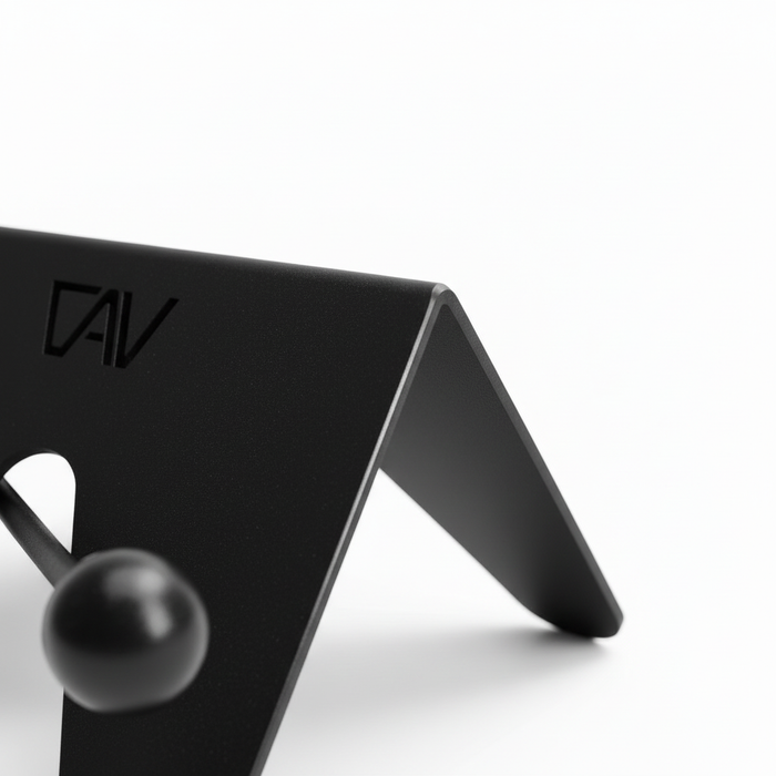 Close-up of black CAV magnetic bike stand corner with angular design and ball detail.