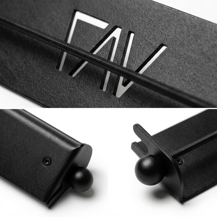 Close-up of CAV magnetic ski and snowboard holder with black metal finish and logo detail