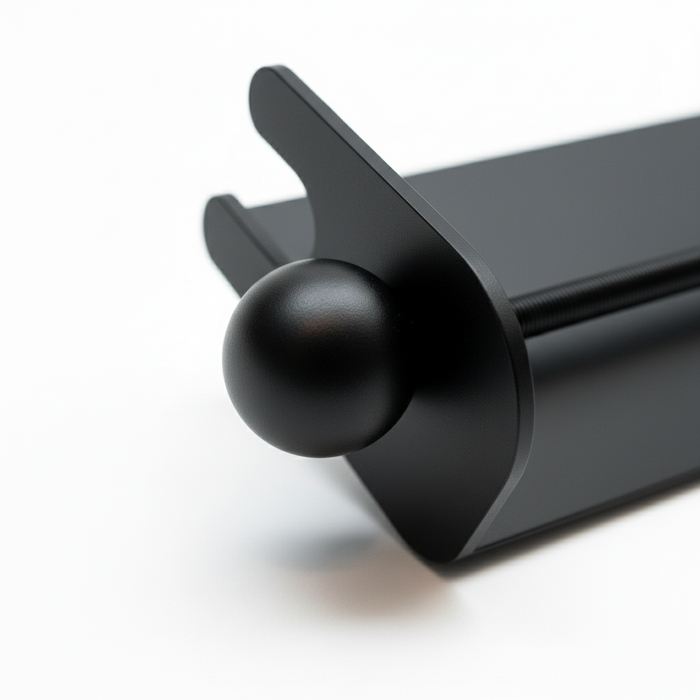 Close-up of a black magnetic ski and snowboard holder with round ball end for mounting.