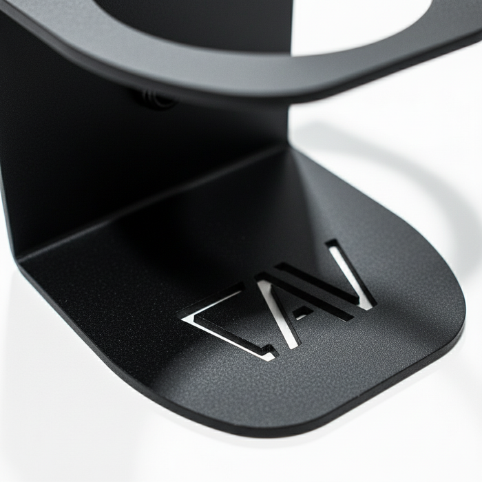 Close-up of black CAV magnetic solo cupholder with cutout logo detail.